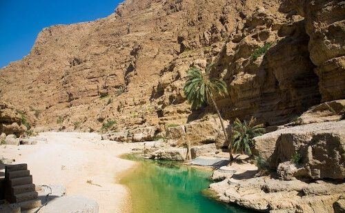 Turquoise wadi pools on an Oman day tour